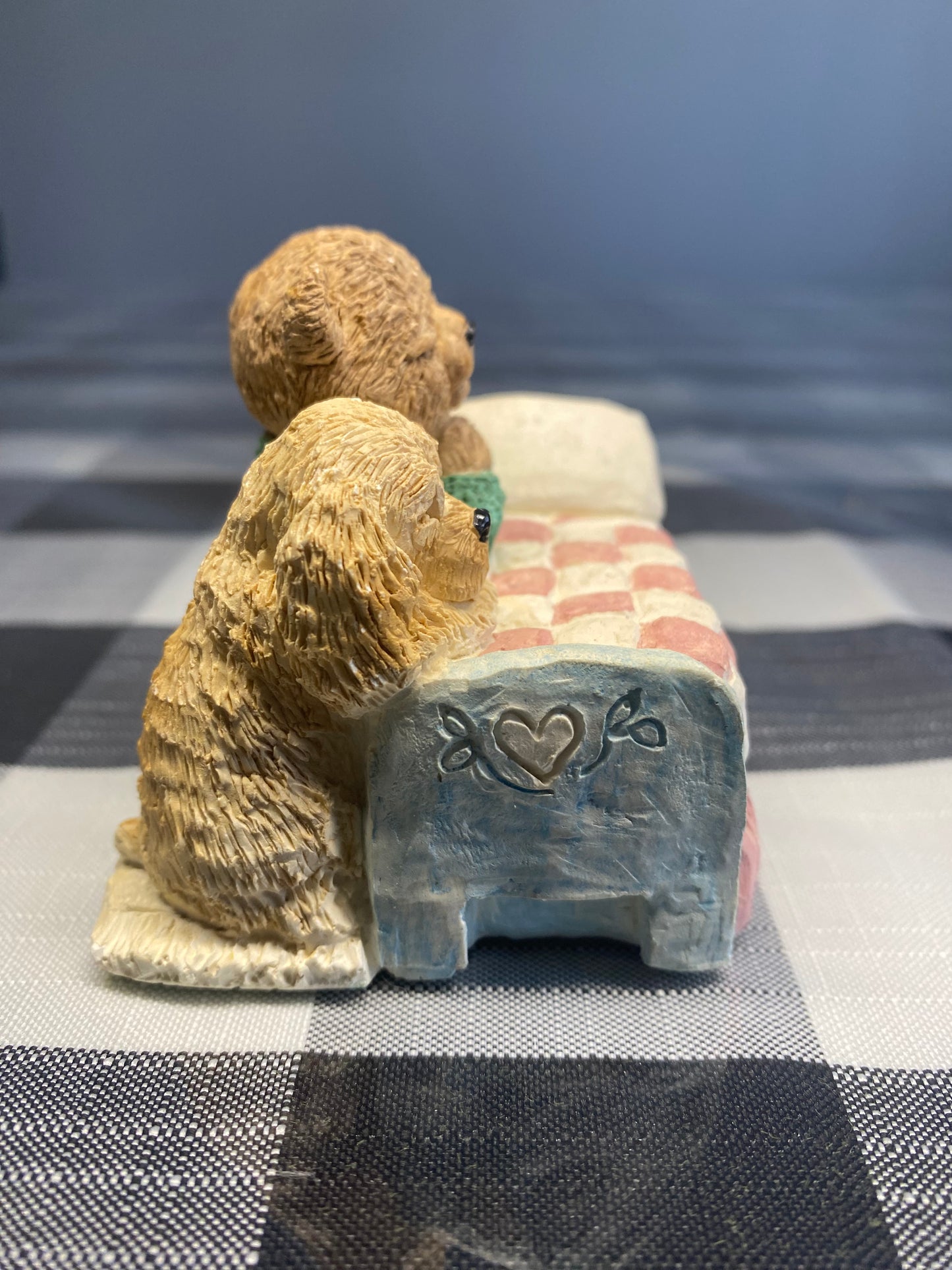 Teddy and dog praying in the bed