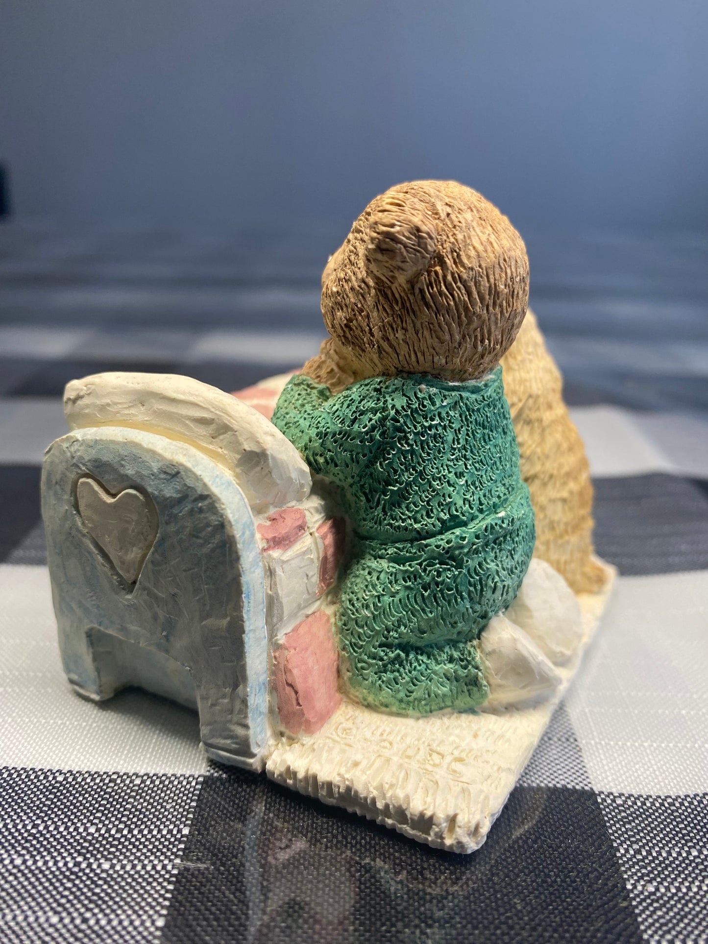 Teddy and dog praying in the bed